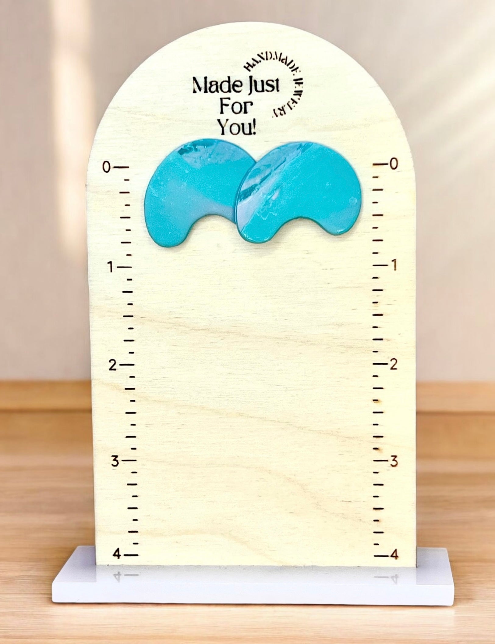 Swirl with Green Studs